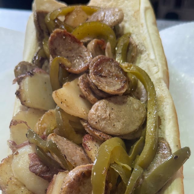 Italian Sausage with homemade vinegar peppers and sliced Red Bliss Potatoes sub.