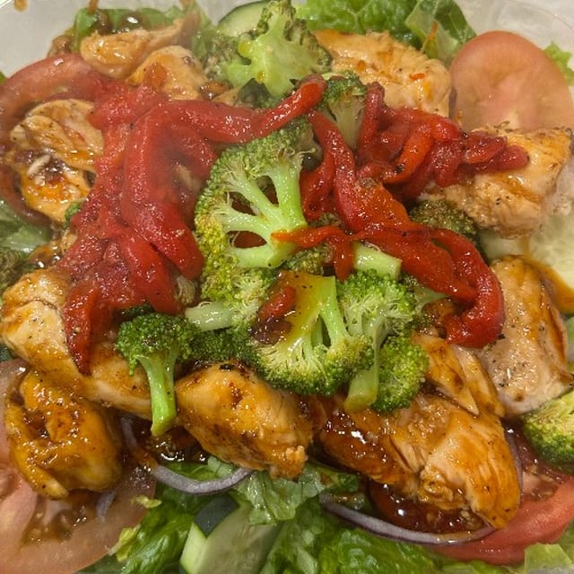 Asian Sweet Chili Chicken Salad with broccoli and roasted peppers.