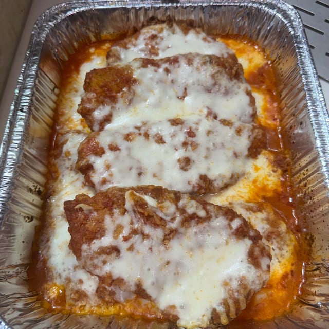 Small Tray Hand breaded Chicken Cutlet Parmigiana.